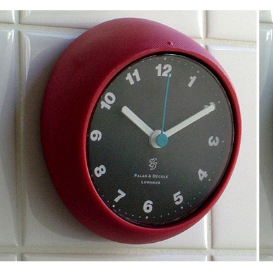vintage wall clock, vilatic style, unique shape.Red
